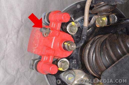 Check the level of brake fluid. The level should be above the "L" line. Compress the brake lever or pedal several times. The lever or pedal should be firm.