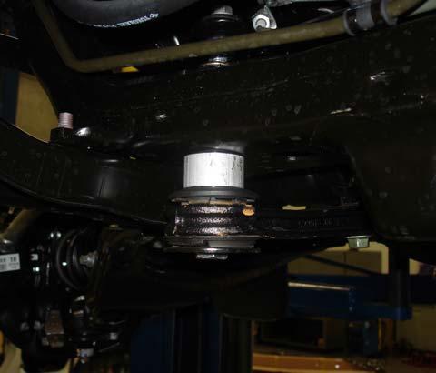 Secure the rear of the skid plate to the rear skid plate frame mounts using the supplied
