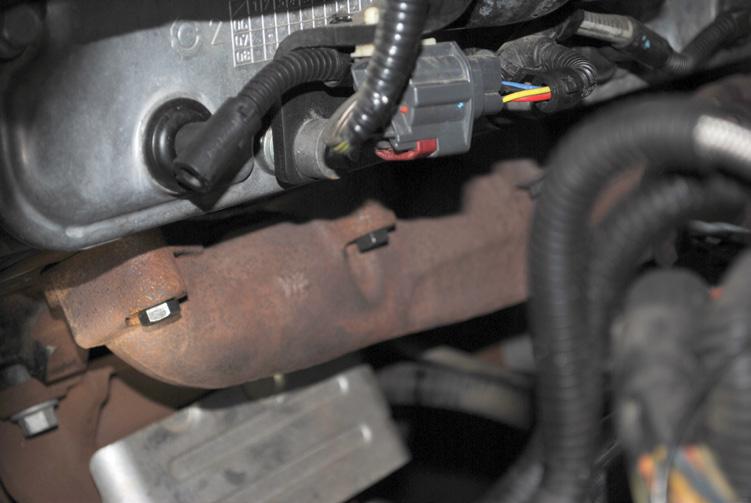 (Image5) Step 23: Use a 0mm wrench to remove the four bolts on the lower EGR cooler mount.