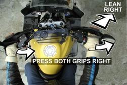Or, you might try concentrating on moving both grips toward the direction of turn. That is, leaning into a right turn, consciously press both grips toward the right.