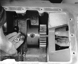 If reverse gear assembly is disassembled, press the needle bearing and position the inner race into the reverse idler gear.