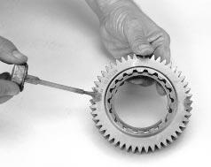 of main drive gear, install the snap ring.. Use toolmaker s dye and mark the main drive gear for timing purposes.