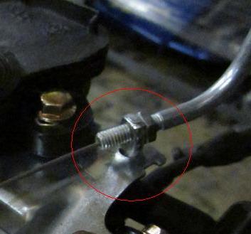 on the throttle cable screw and bottom of throttle cable bracket.