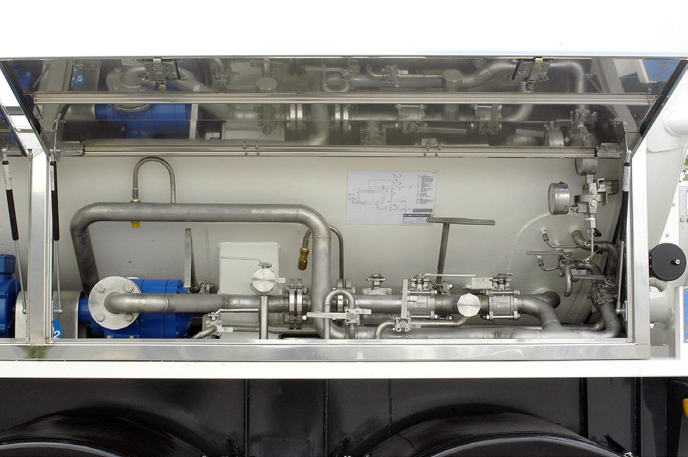 Lockable Machinery Compartment: All stainless steel pipework and valves neatly arranged in a