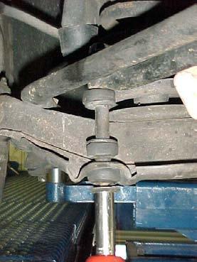 Unbolt and remove the end links from each end of the bar.
