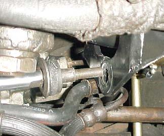 11) Cars with power steering should re-attach the power steering cylinder to the new bracket.