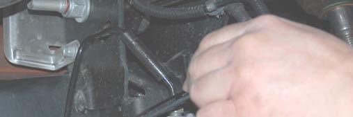 26. Using a 10mm wrench remove the brake line