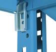 splice channels into bottom upright assembly posts and fit second-level upright assembly posts over channel extensions.