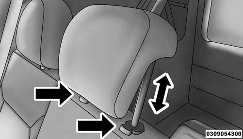 To remove the head restraint, push the release buttons while pulling upward on the whole assembly and raise it as far as it can go.