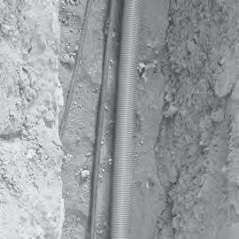Selected backfill (not tamped) at least 6" over the top of the conduit is recommended. After final backfill is placed, tamping may be used to finish the grade.