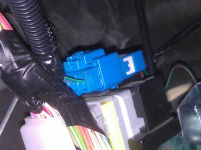 Once the harness is finished, you can now connect the blue electrical connector for the harness.