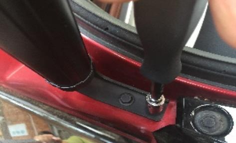 Remove the OEM strut ball mounts from both sides of the lift gate.