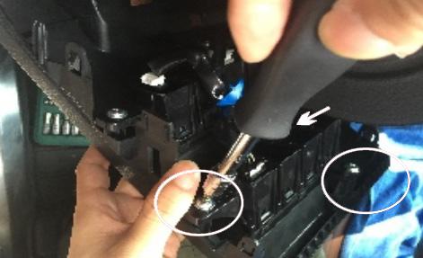 Remove the 3 screws that secure the control buttons to the driver's lower dash