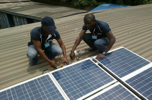 Figure 13: Engineers testing the voltage level of installed solar panels at Ikoyi, Lagos CONCLUSION We look forward to working with you and supporting your efforts to improve your alternative power