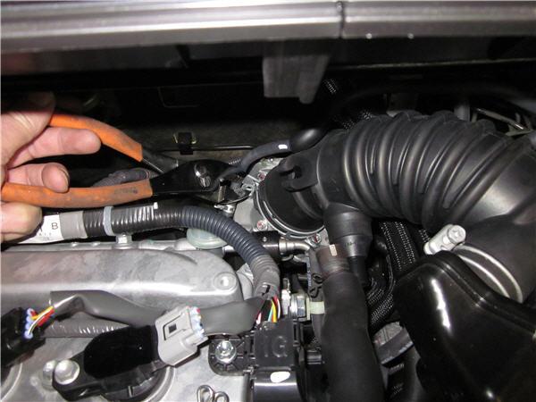 13. Disconnect the crank case vent hose from the inlet hose. (Fig. C 13) i.
