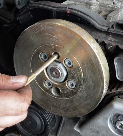 Disconnect the vehicle battery. Do not turn the crankshaft and camshaft once the timing belt has been removed.