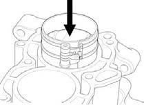 Install the piston/ connecting rod assembly with the piston "IN" mark facing the intake side. Coat the cylinder walls, piston outer surfaces and piston rings with engine oil.