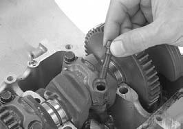When reusing the connecting rods, they must be installed in their original locations. PISTON RING COMPRESSOR Make sure the piston ring compressor tool sits flush on the top surface of the cylinder.