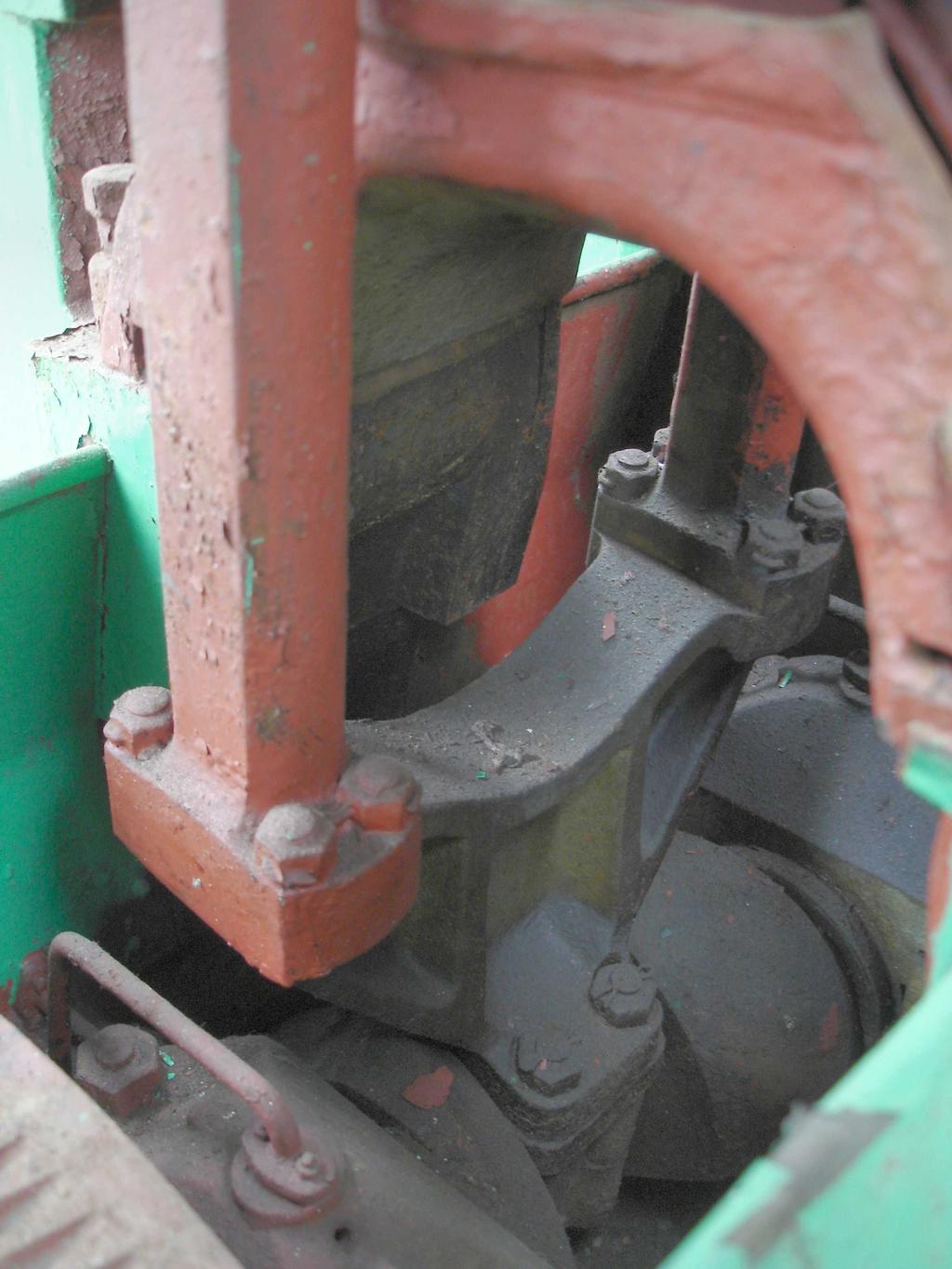 The piston was then connected to the crankshaft by means of two side connecting rods to a fork at the bottom end bearing (the big end).