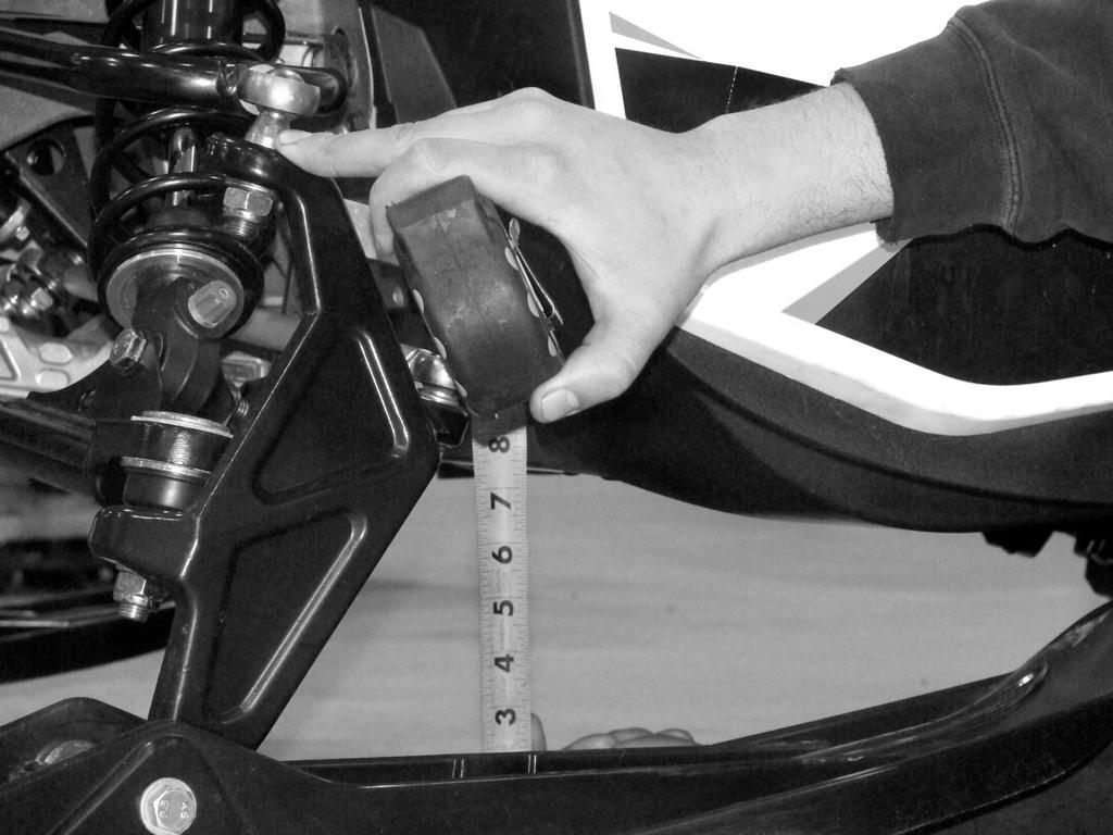 MEASURE STOCK SETTINGS Step 1 BEFORE REMOVING STOCK SHOCK ABSORBERS Start with the vehicle on a flat surface. Push down on the front bumper 3 times to settle the front end.