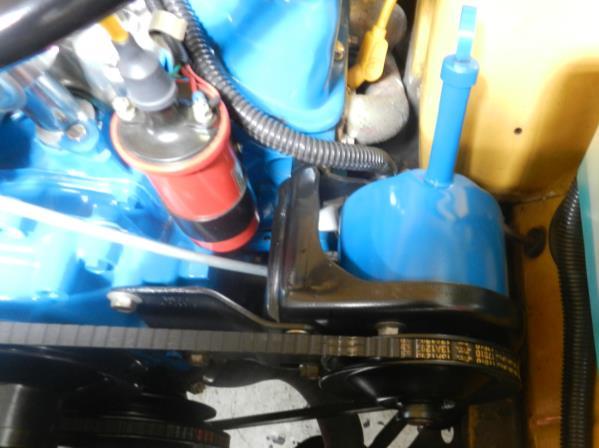 3. If equipped remove the power steering pump, brackets and lines.