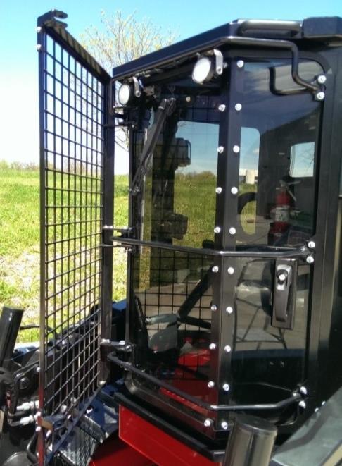 Cab Features Swing Away Brush Guard For