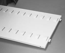 The bottom of the panel (or extension) has two tabs that will fit in the divider slots in the rotor bottom or shelf (Figure 23).