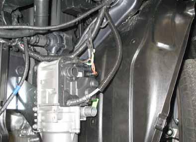 Mount the fuel line and wiring harness with rub protection on sharp edges. WARNING! The fuel line and wiring harness are routed to the metering pump in as shown in the wiring harness routing diagram.