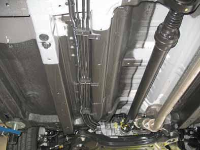 lines 38 Route fuel line and wiring harness of metering pump into corrugated tube in underbody to the