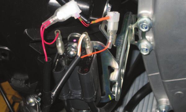 15 Unplug the RED/BLACK wire from the ignition coil and plug the set of RED colored wires