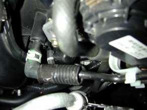 Pull the vacuum hose off of the nipple on the intake manifold