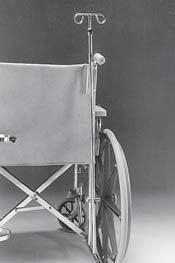 Holder is positioned not to interfere with the wheelchair back when reclined.