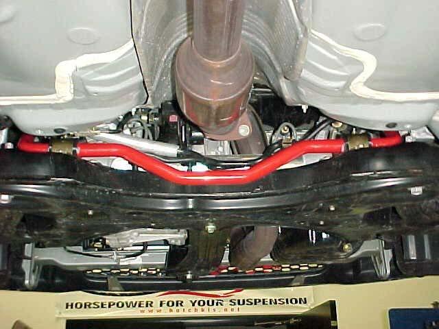 9) With the stock sway bar removed, set your new Hotchkis bar next to it for reference and orientation.