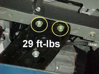 3 Install the 2 bolts that secure the cradle bridge bracket to the radiator support.