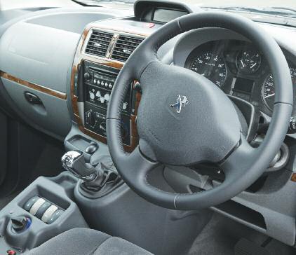 The carefully sculpted driver's seat comes with active, pump-action height and tilt adjustment which,