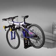 up to four bicycles. A hand-operated tiltdown lever allows access to the cargo area without removing the carrier.