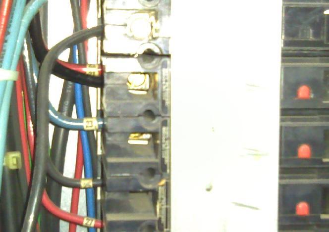 Two wires are terminated in the same lug which can cause poor connection.