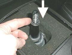 12. Install the sound insulator foam block into the console. 13. Modify and install the shift control knob. A.
