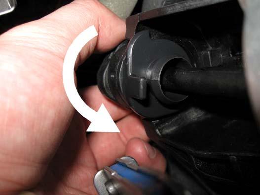 From the driver side, the same procedure needs to be done to unclip the side shifter cable from the shifter assembly.