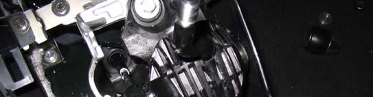 12. You can also use a round edge visegrip to remove the shifter cables from the assembly if they are too tight to be