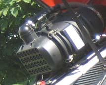 FEATURES AND BENEFITS MASSEY FERGUSON 6400 SERIES Air Intake System The cassette style air cleaner is located at the very front of the tractor inside the single-piece hood.