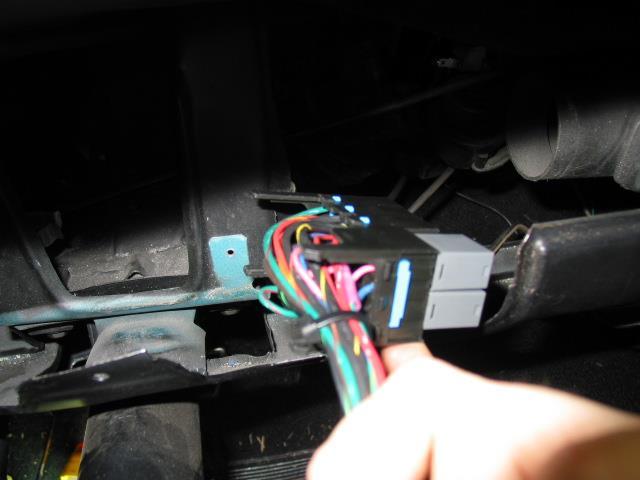 Figure 6-3 Routing Fuse Block through Instrument Cluster Opening 6.1.