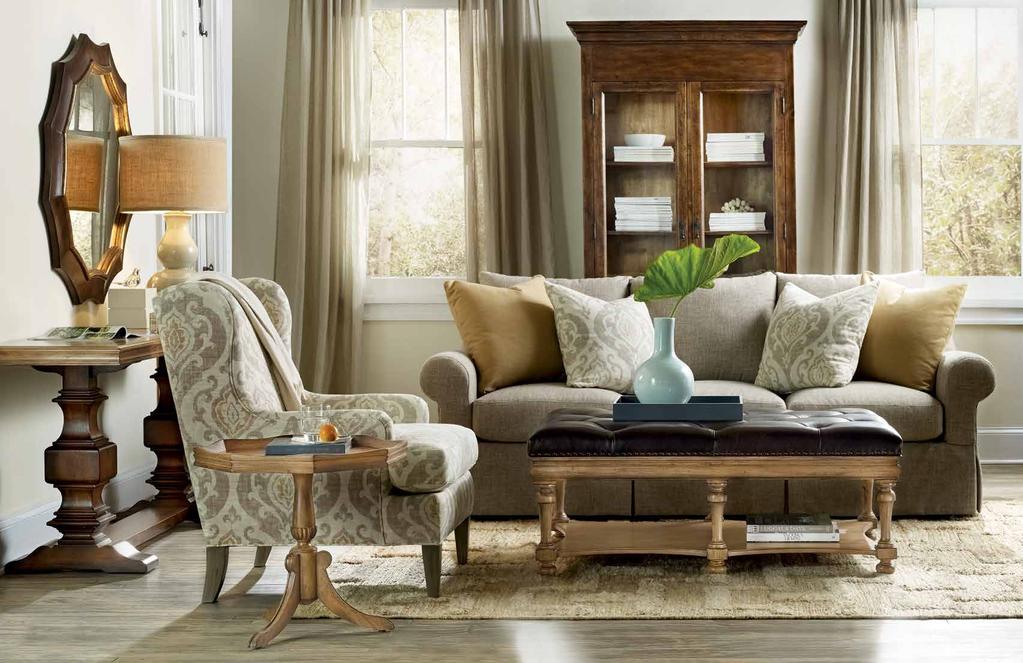 LIVING ROOM TABLES & ACCENTS From the display cabinet inspired by an antique from Savannah, Ga.