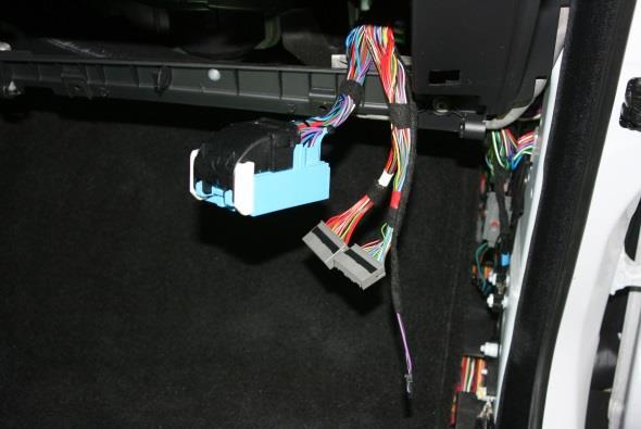 The large Blue Connector and 2 Grey Connectors can be pulled through the glove compartment