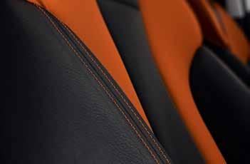 velvet leather - Front centre armrest, knee pads and armrests in the doors in black leather with contrasting stitching in capri orange - Steering wheel, gear level and gear gaiter in black leather