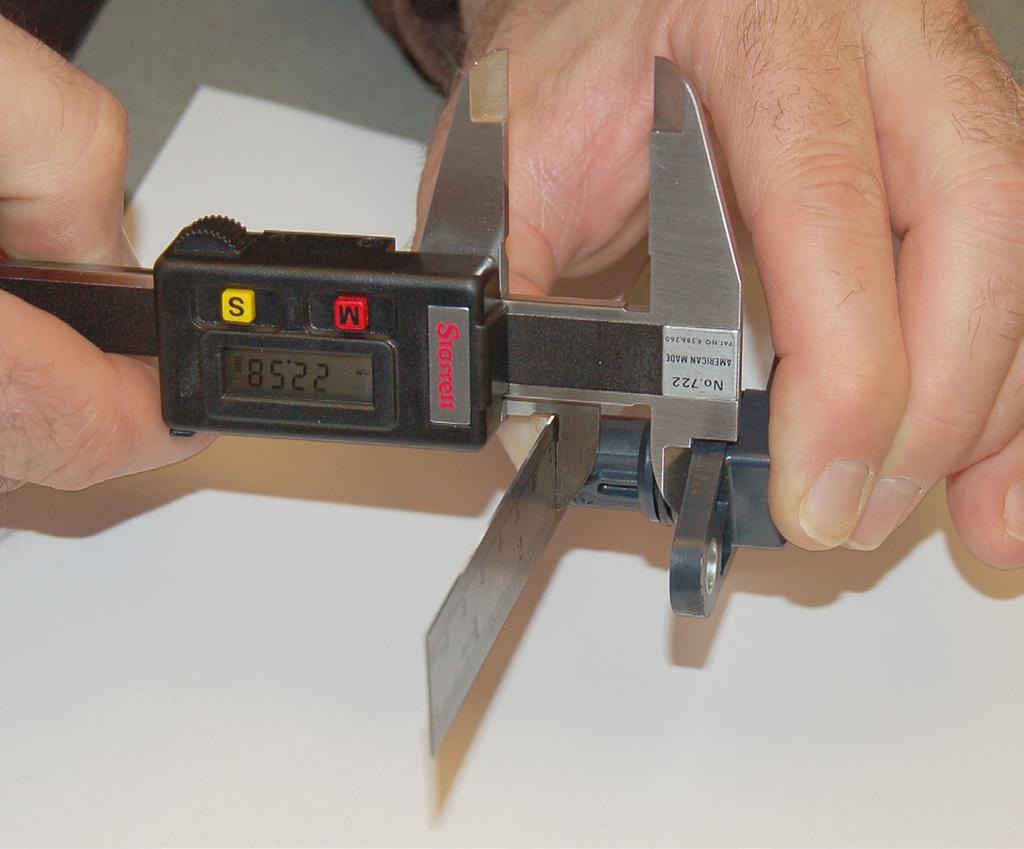 When taking measurement B, use a flat steel ruler or equivalent along with the digital caliper. 7.