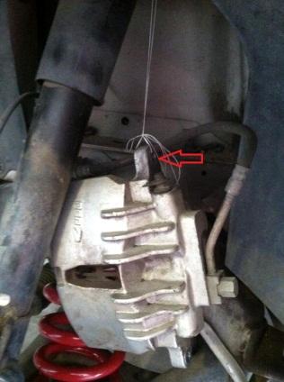 Remove the brake calipers from the spindles on both sides of the vehicle