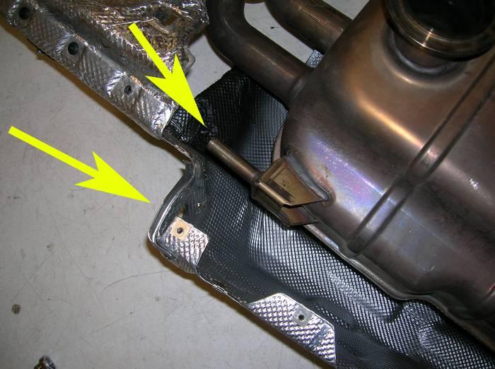 Slide the muffler assembly to one side to