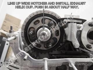 #16 Locate the exhaust helix cup. Intake and exhaust cups are identical, but if you are reinstalling used cups, it's best to keep the cups matched to the cams they came off from.