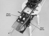 INSTALLING YOUR GYRO, ELECTRONIC SPEED CONTROL AND RECEIVER Mount your gyro to the right side of the main frame, in the small mounting space below the main gear and directly above the top of the